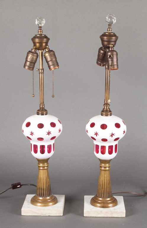 Appraisal: Pair of old reproduction cased ruby glass lamps in the