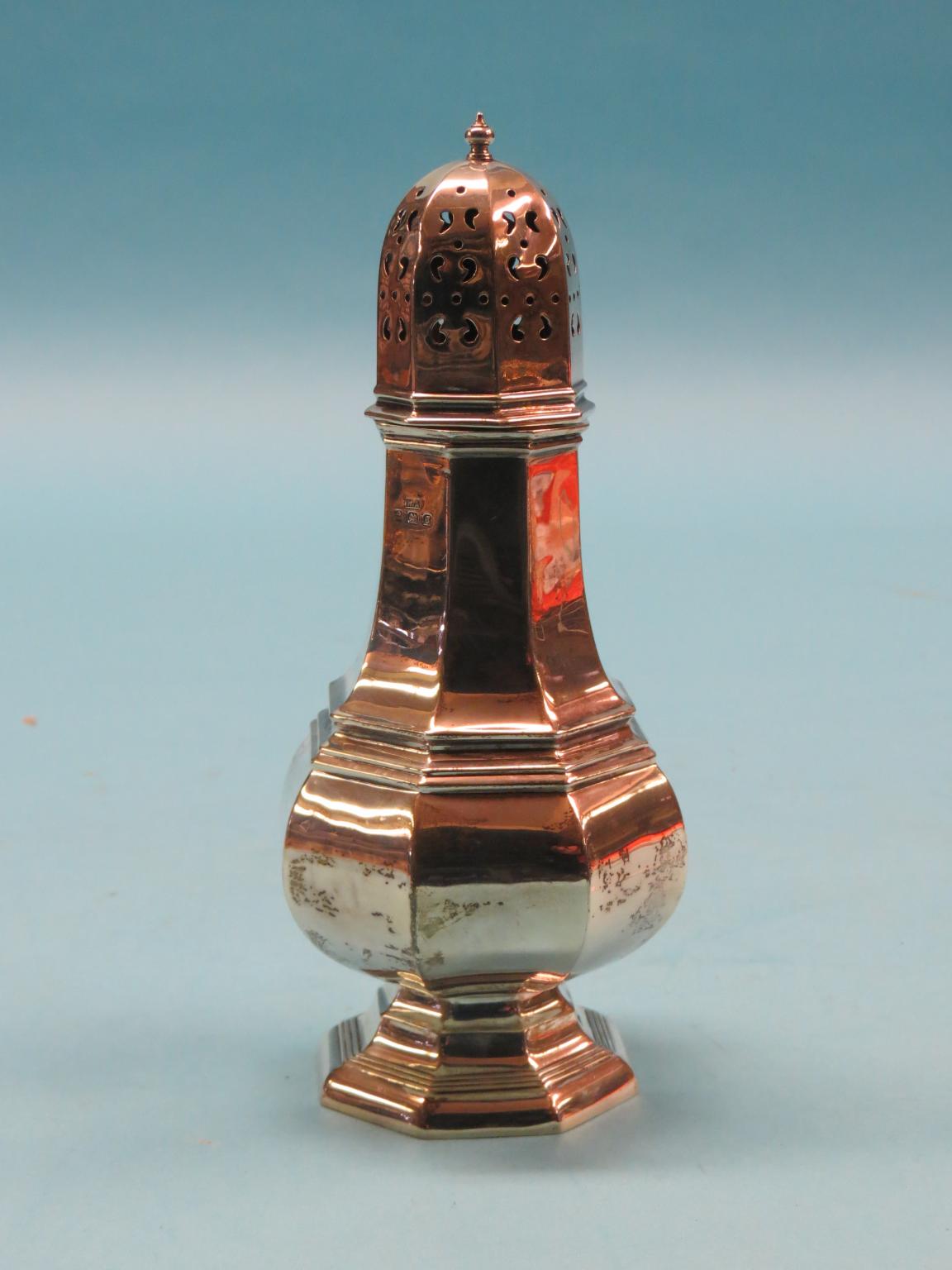 Appraisal: A Georgian-style silver sugar caster octagonal baluster form Birmingham approx