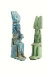 Appraisal: EGYPTIAN FAIENCE USHABTI - Seated Amun in pale green glaze