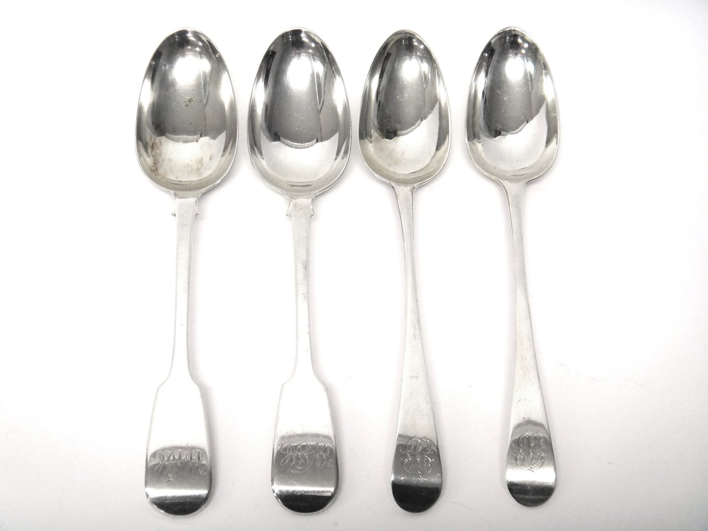 Appraisal: A pair of silver Hanoverian pattern bottom marked tablespoons London