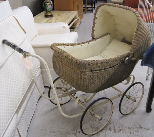 Appraisal: WICKER BABY CARRIAGE American early th century