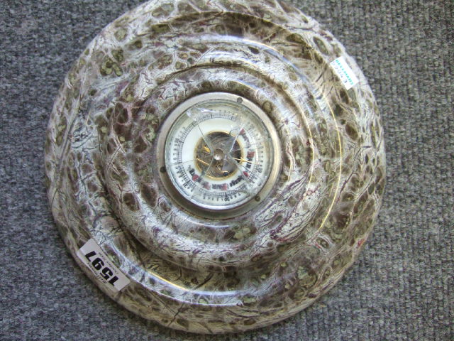 Appraisal: A Cornish serpentine circular wall mounted barometer