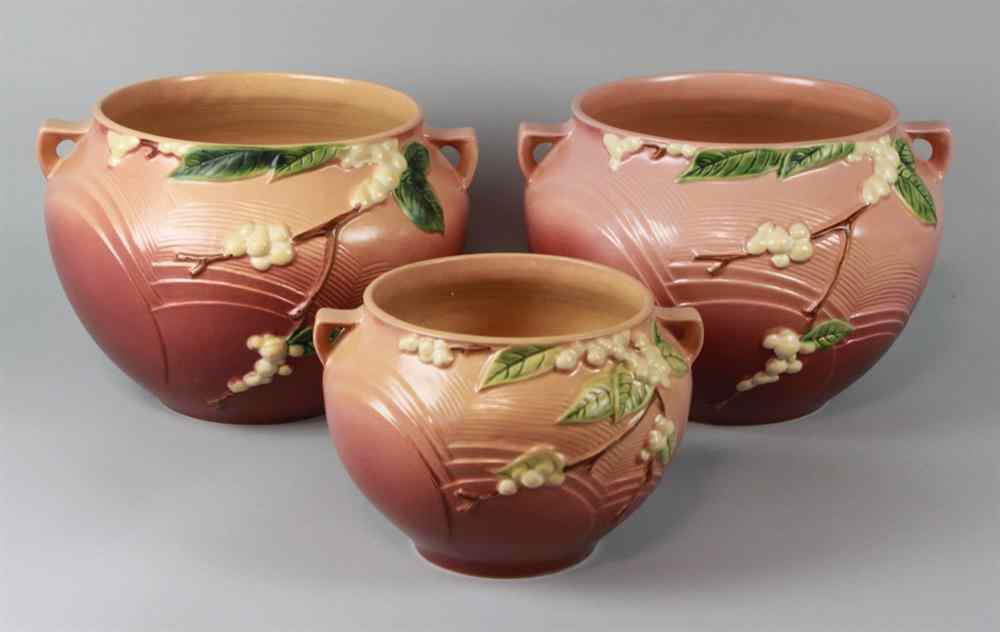 Appraisal: PAIR LARGE ROSEVILLE POTTERY SNOWBERRY PATTERN PLANTERS including smaller planter