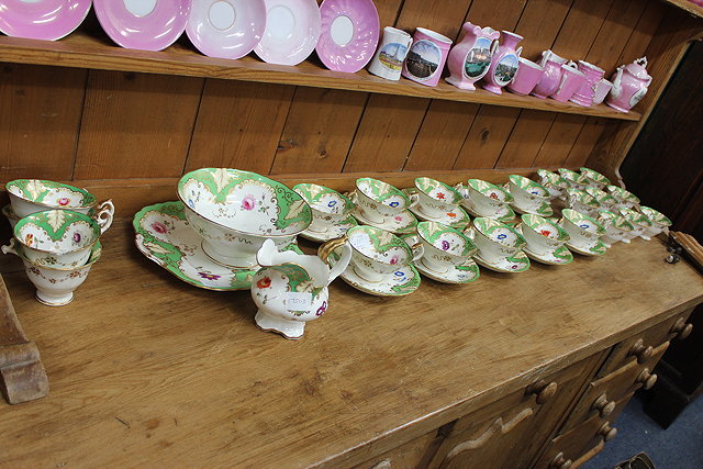 Appraisal: A VICTORIAN STAFFORDSHIRE PORCELAIN PART TEA SERVICE having a green