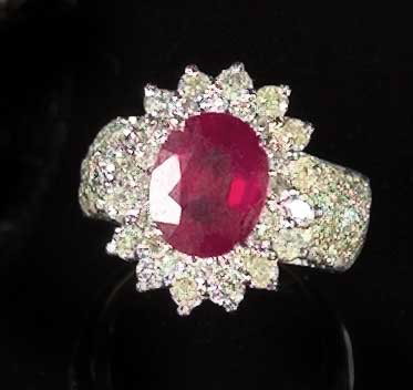 Appraisal: Fourteen-Karat White and Yellow Gold Ruby and Diamond Dinner Ring