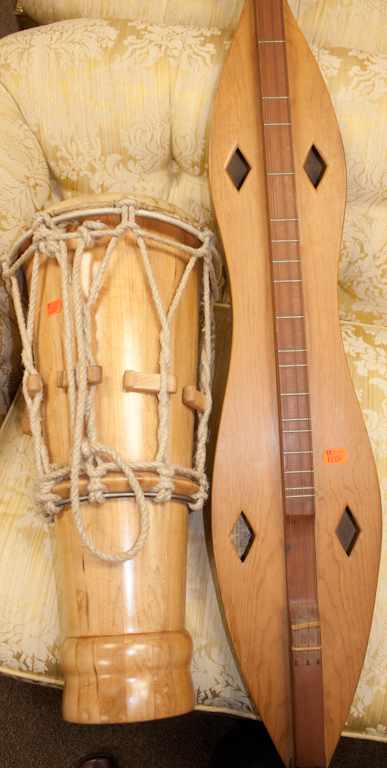 Appraisal: Sandalwood string instrument and a maple congo drum Estimate -