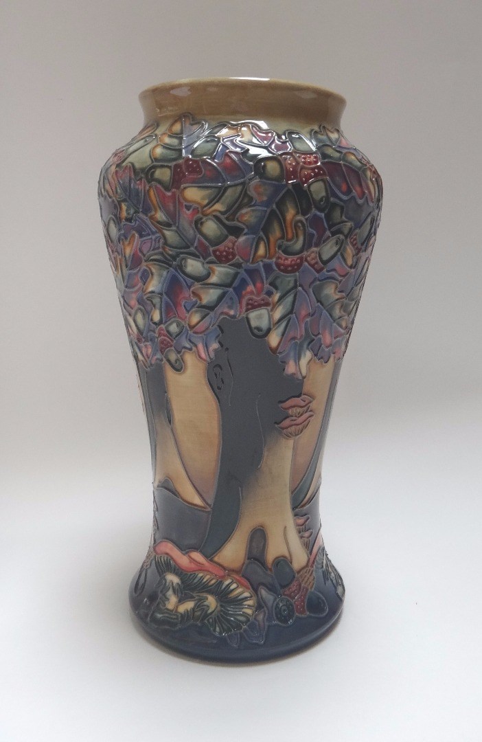 Appraisal: A Moorcroft pottery vase circa decorated with stylised oak trees