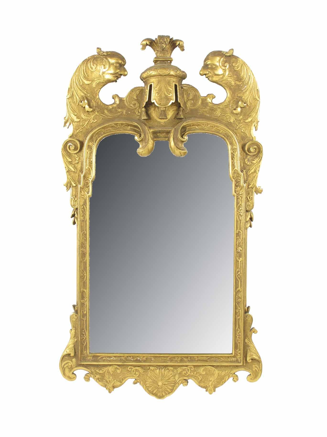 Appraisal: A giltwood and gesso wall mirror in George I style