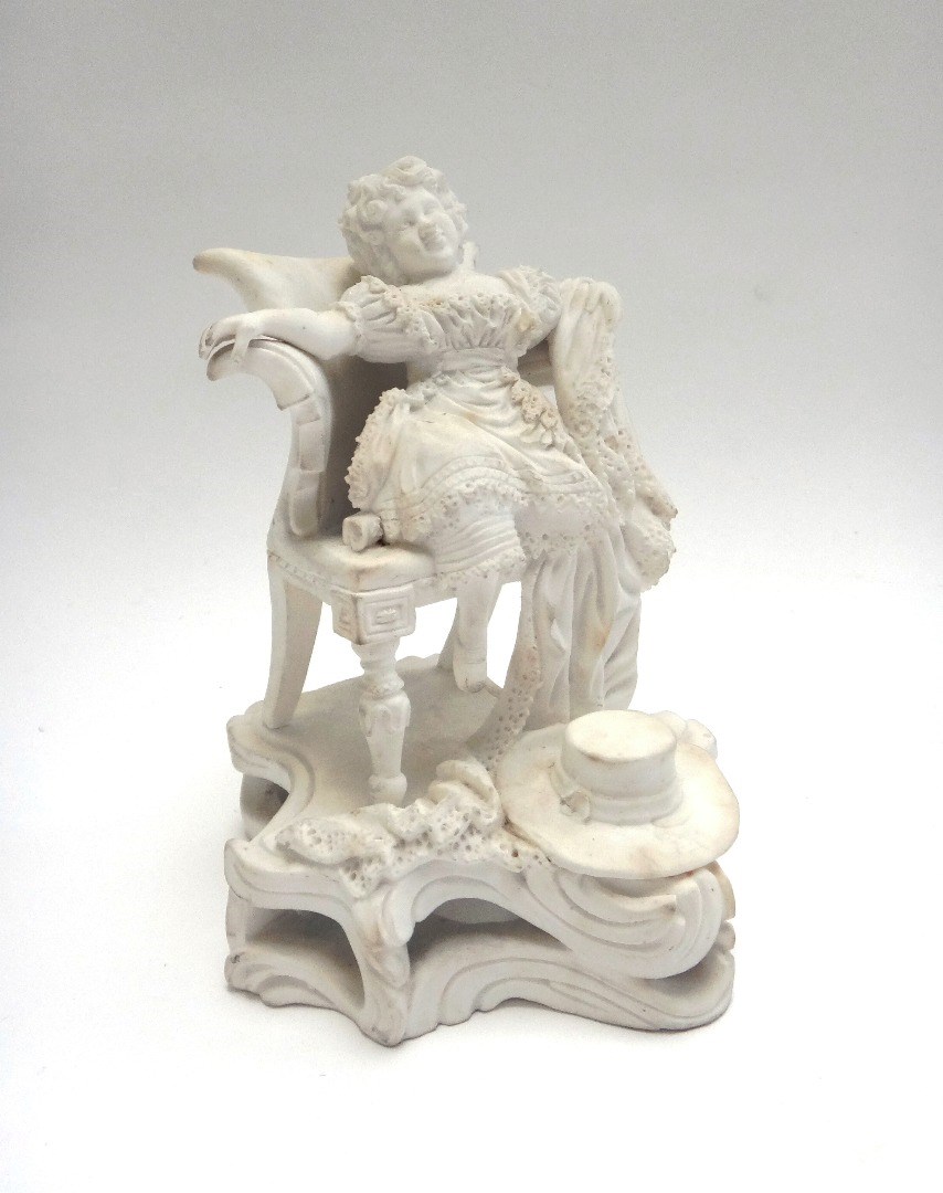 Appraisal: A Minton biscuit porcelain figure circa modelled as a young