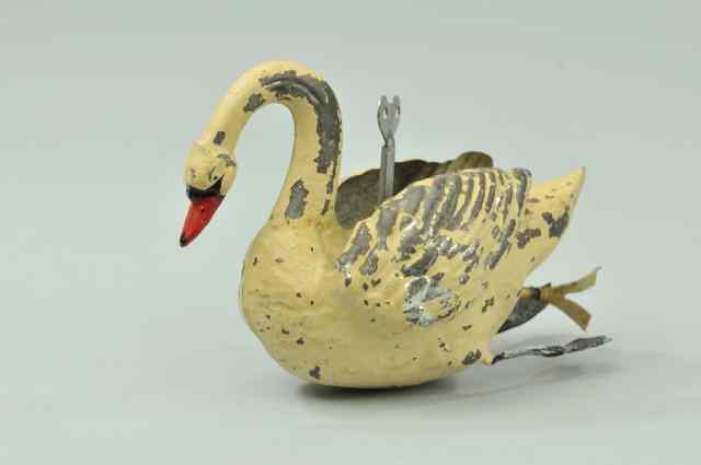 Appraisal: MECHANICAL SWAN TOY Germany hand painted in white overall well