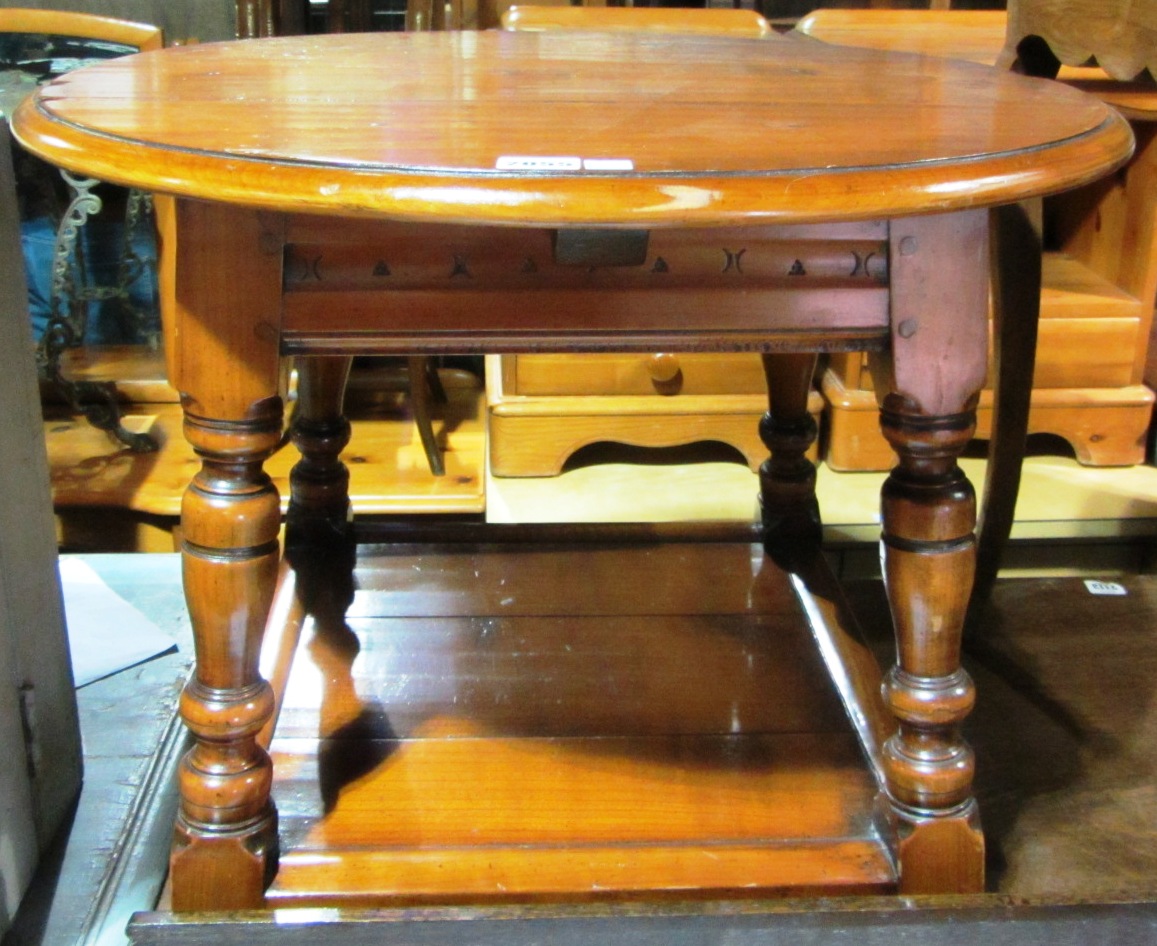 Appraisal: A th century circular fruitwood occasional table