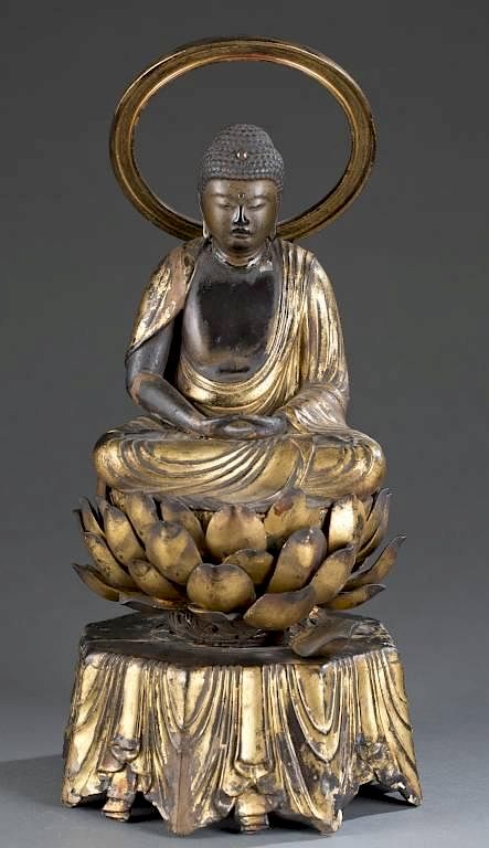 Appraisal: Japanese Buddha in lotus position A Japanese Buddha th century