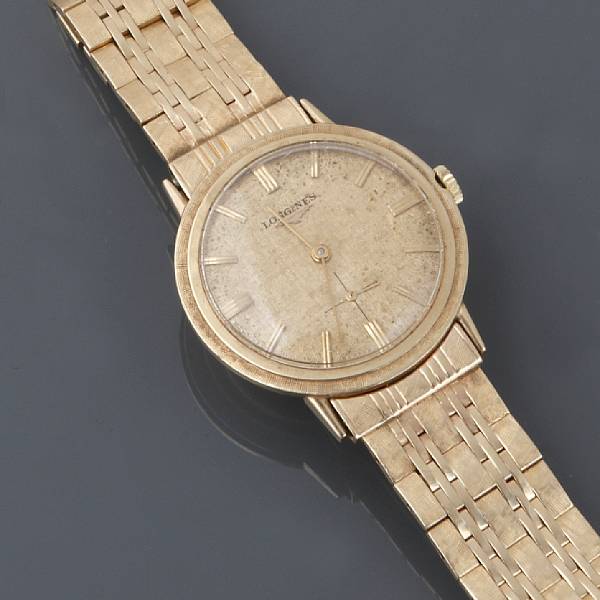 Appraisal: A k gold bracelet wristwatch Longines gold tone dial in