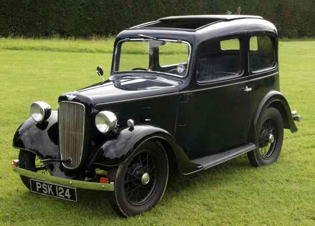 Appraisal: A Austin Ruby black painted and with leather interior and