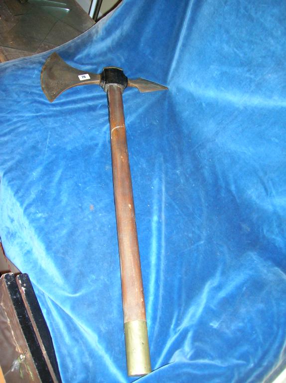 Appraisal: A large battle axe with crescent shaped blade possibly part