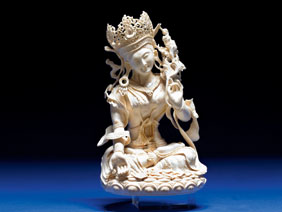 Appraisal: MAMMOTH IVORY CARVING A very intricately pierced-carved mammoth ivory figure