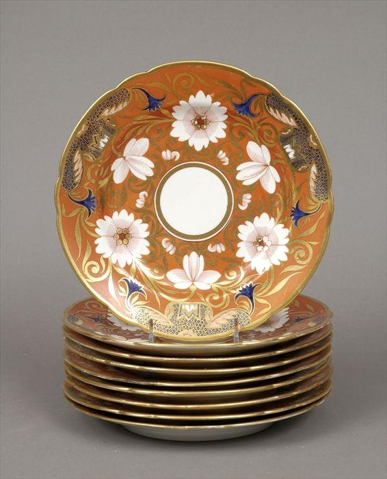 Appraisal: Nine English Gilt and Polychrome Decorated Orange-Ground Porcelain Dessert Plates