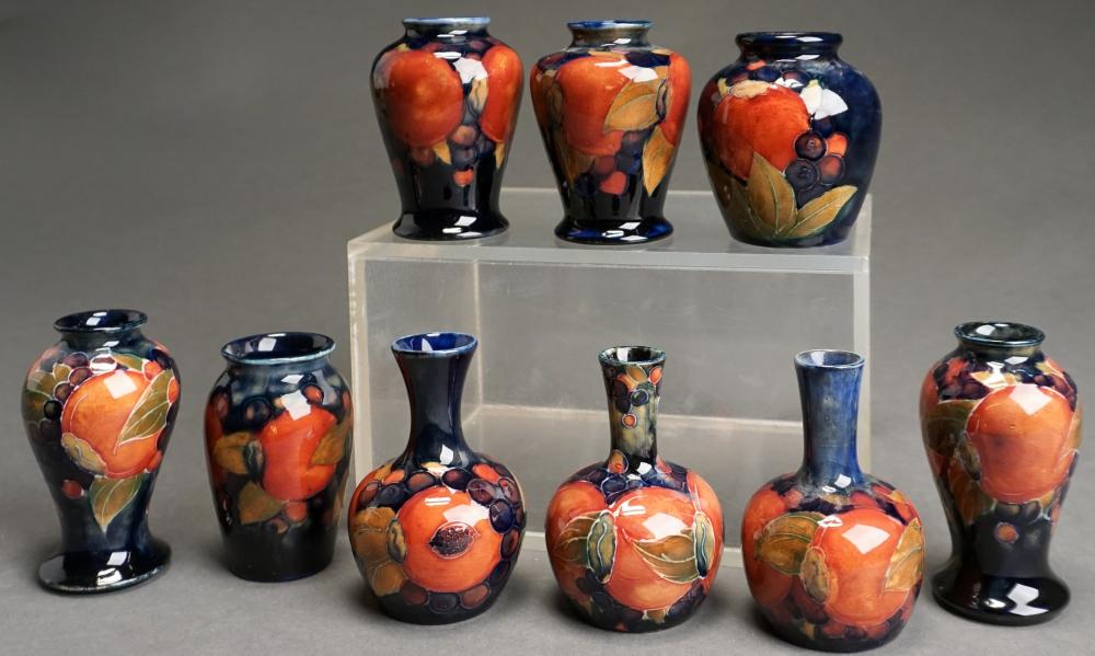 Appraisal: Collection of Nine Assorted Moorcroft Pottery 'Pomegranate' Cabinet Vases H