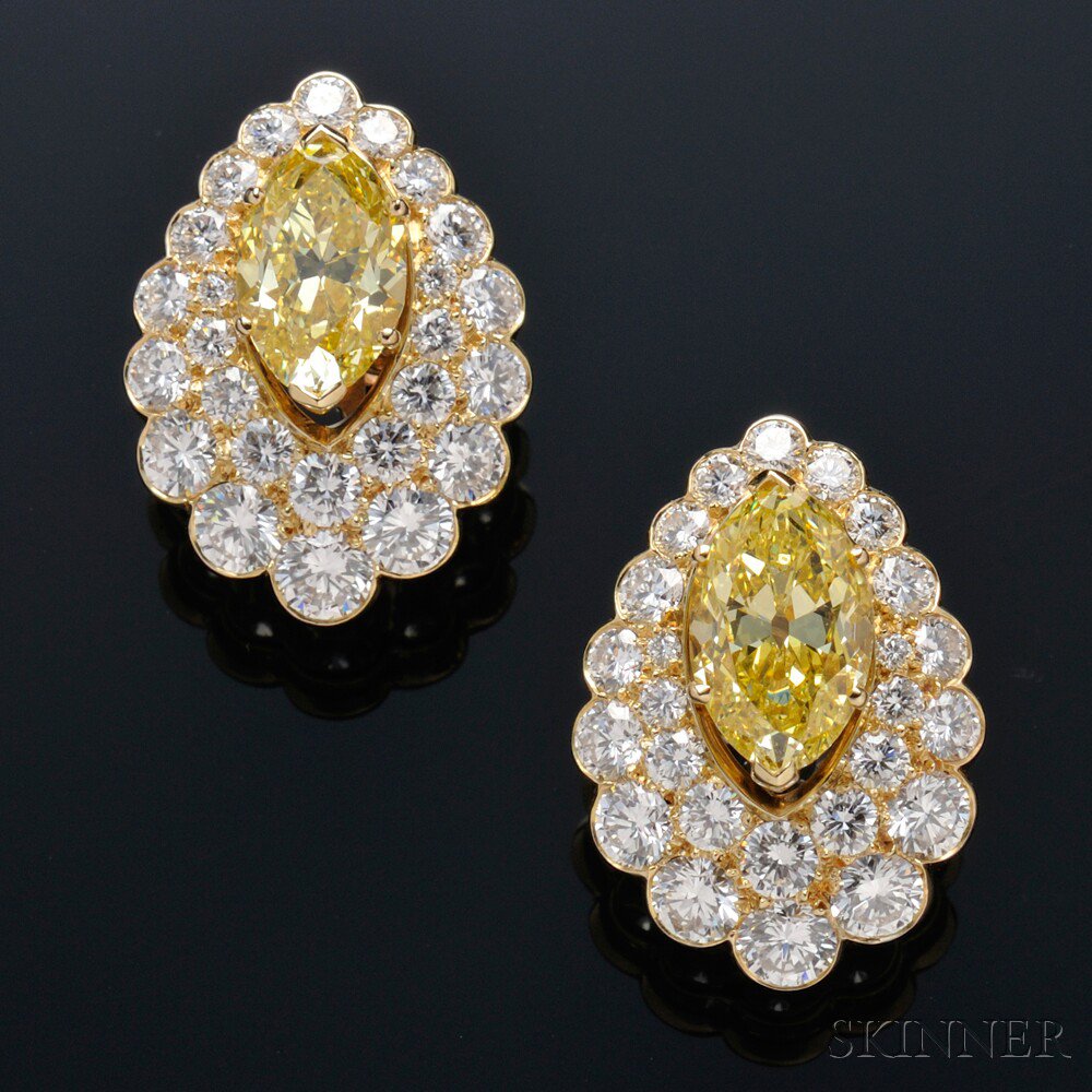 Appraisal: Fancy-colored Diamond and Diamond Earrings centering two oval-cut diamonds weighing