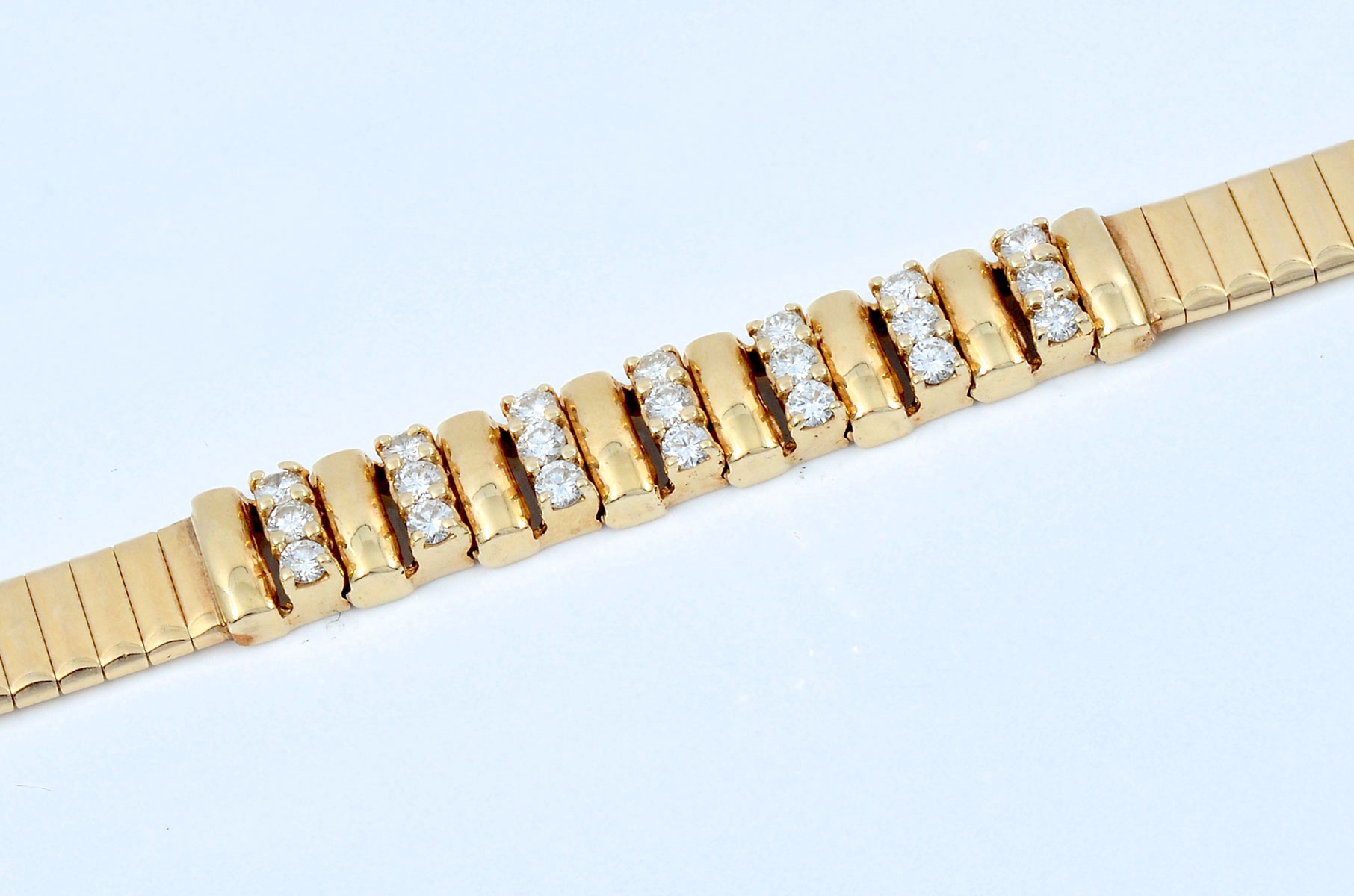 Appraisal: GRAM K GOLD DIAMOND BRACELET K yellow gold bracelet contains