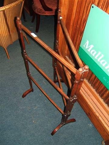 Appraisal: A Victorian mahogany two fold towel rail wide