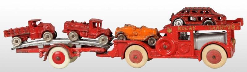 Appraisal: Cast Iron Hubley New Car Carrier Toy Description The two