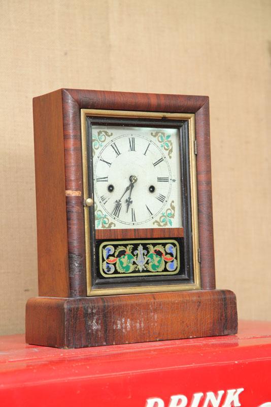 Appraisal: NEW HAVEN SHELF CLOCK Eight day time strike having brass