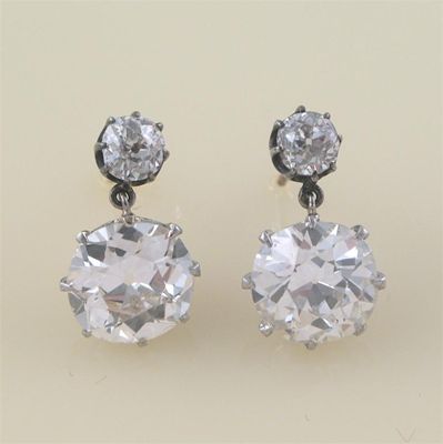 Appraisal: A pair of diamond double drop earrings each earring set