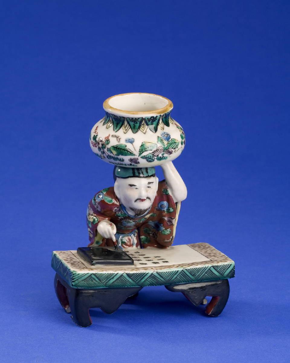 Appraisal: CHINESE EXPORT PORCELAIN FAMILLE VERTE FIGURAL INK POT Modeled as