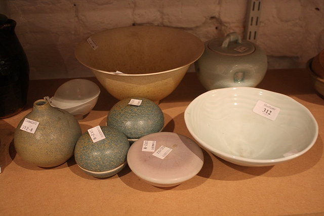 Appraisal: A JOANNA HOWELLS STUDIO POTTERY CELADON BOWL and a crackled