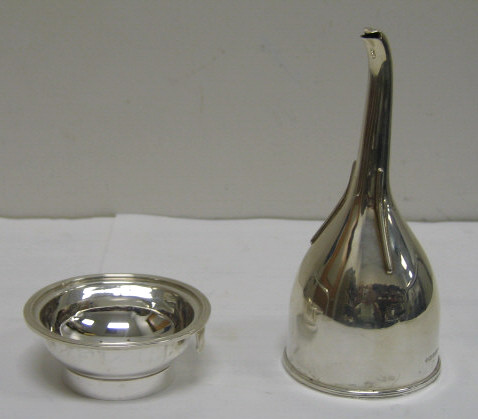 Appraisal: STERLING SILVER TWO-PART WINE FUNNEL Georgian style with curved spout