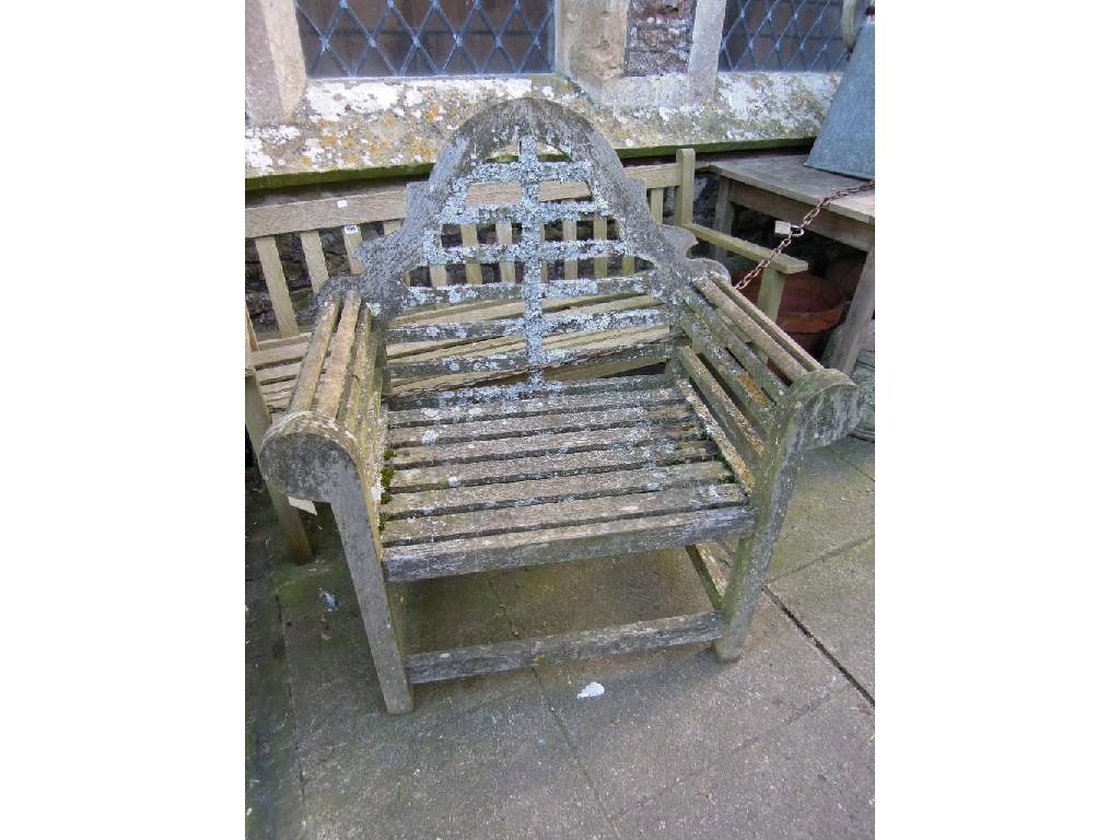 Appraisal: A weathered teakwood garden seat to a Lutyens design with