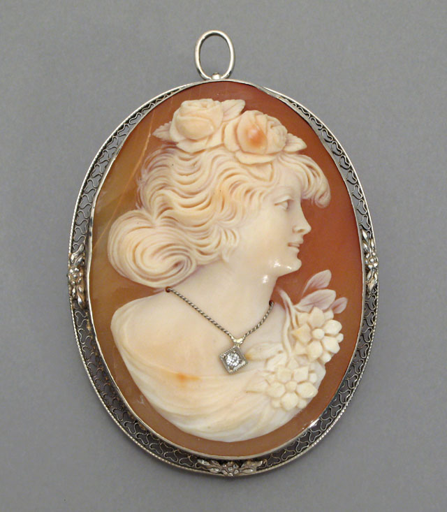 Appraisal: LATE VICTORIAN PORTRAIT SHELL CAMEO PENDANT BROOCH the side profile