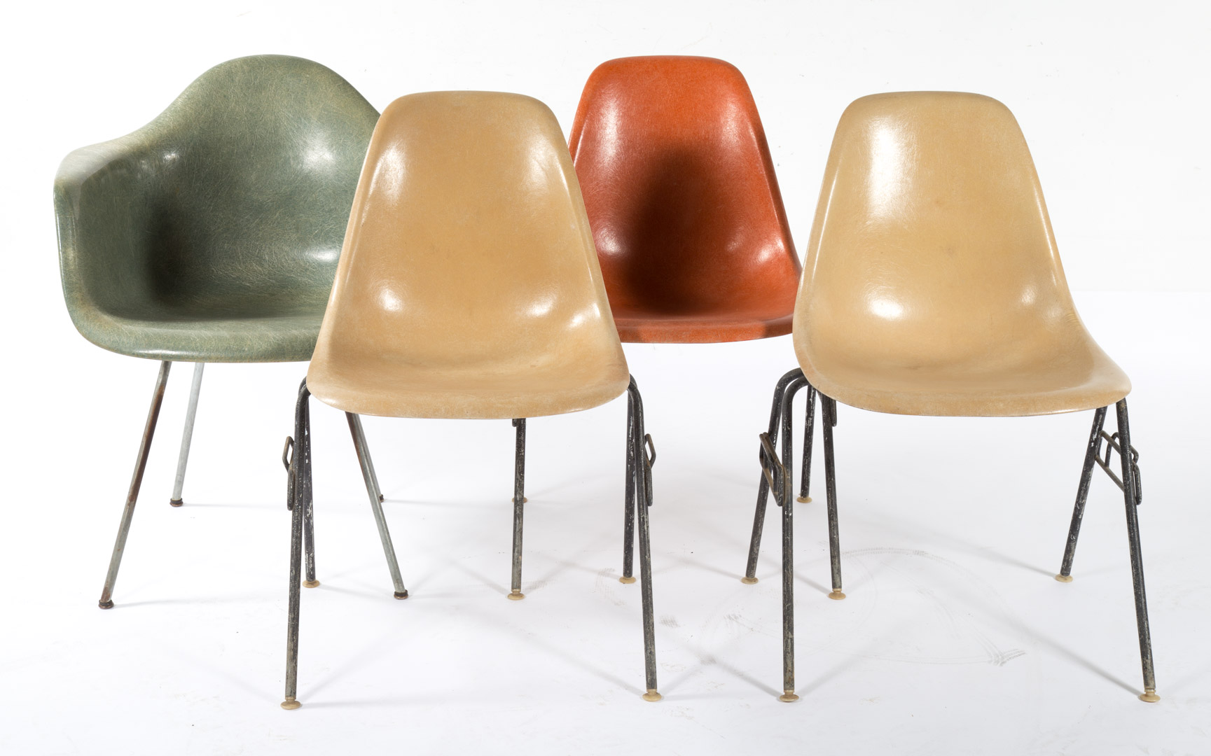 Appraisal: Mid-century modern fiberglass Shell armchair Charles Eames and three matching