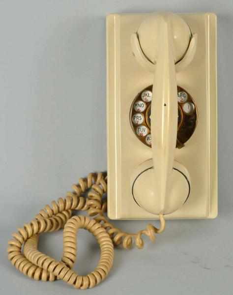 Appraisal: Western Electric Ivory Wall Telephone Circa Shell and handset are