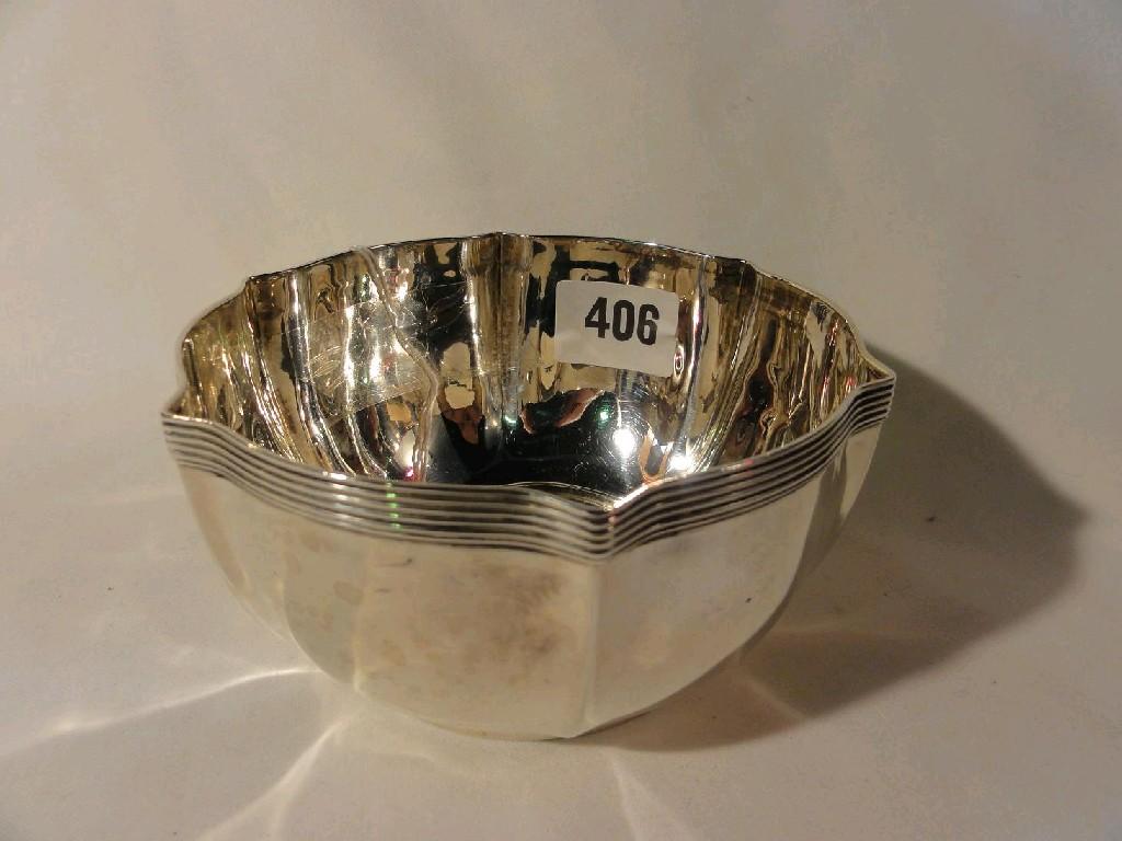 Appraisal: An open silver bowl of shaped form with reeded border