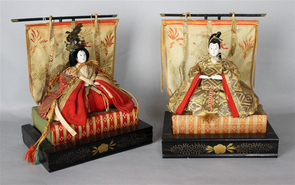 Appraisal: PAIR OF JAPANESE EMPEROR AND EMPRESS DOLLS dressed in classical