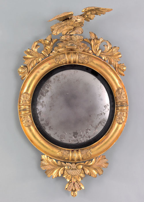 Appraisal: Giltwood convex mirror ca bearing the label of E Fisher