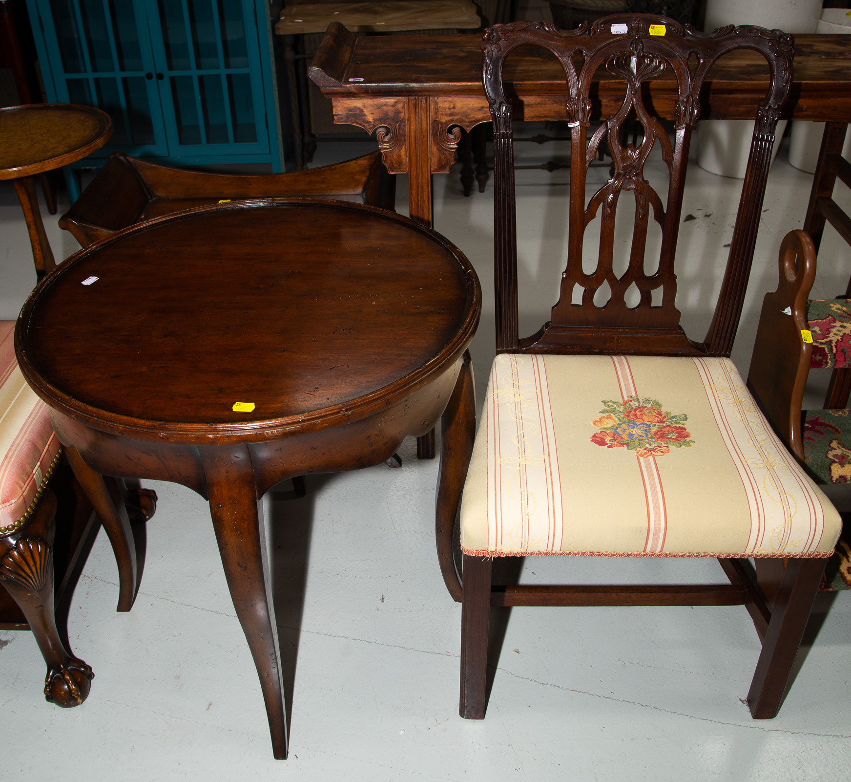 Appraisal: CHERRY CENTER TABLE CARVED MAHOGANY SIDE CHAIR Comprising a French