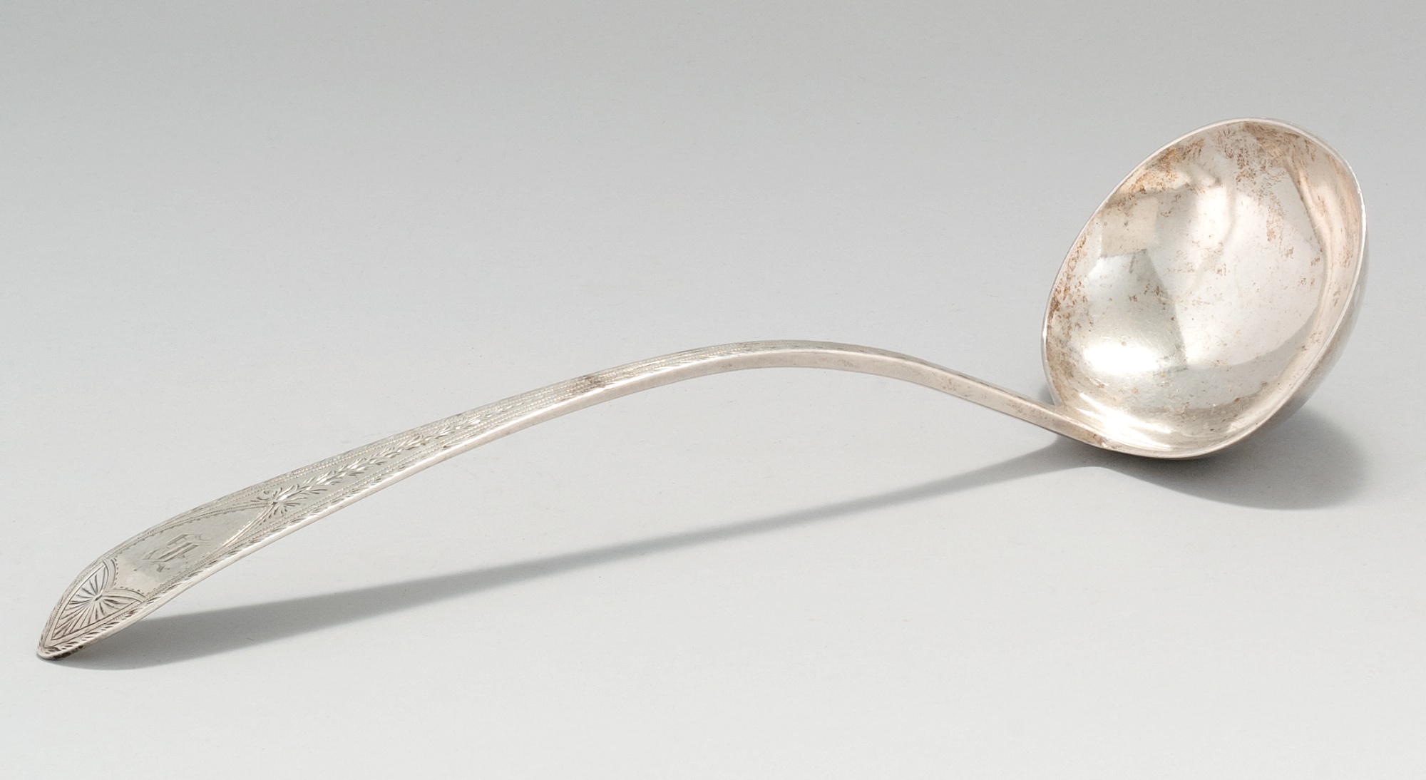 Appraisal: AMERICAN SILVER LADLE Circa With brightcut design Monogrammed B Mark