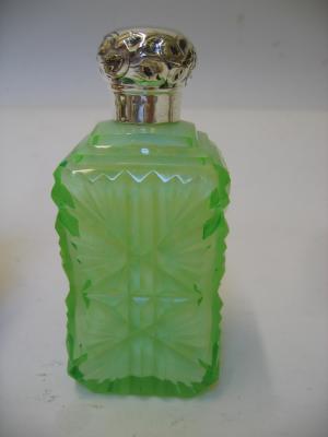 Appraisal: A VICTORIAN CUT GLASS SCENT BOTTLE London the green oblong