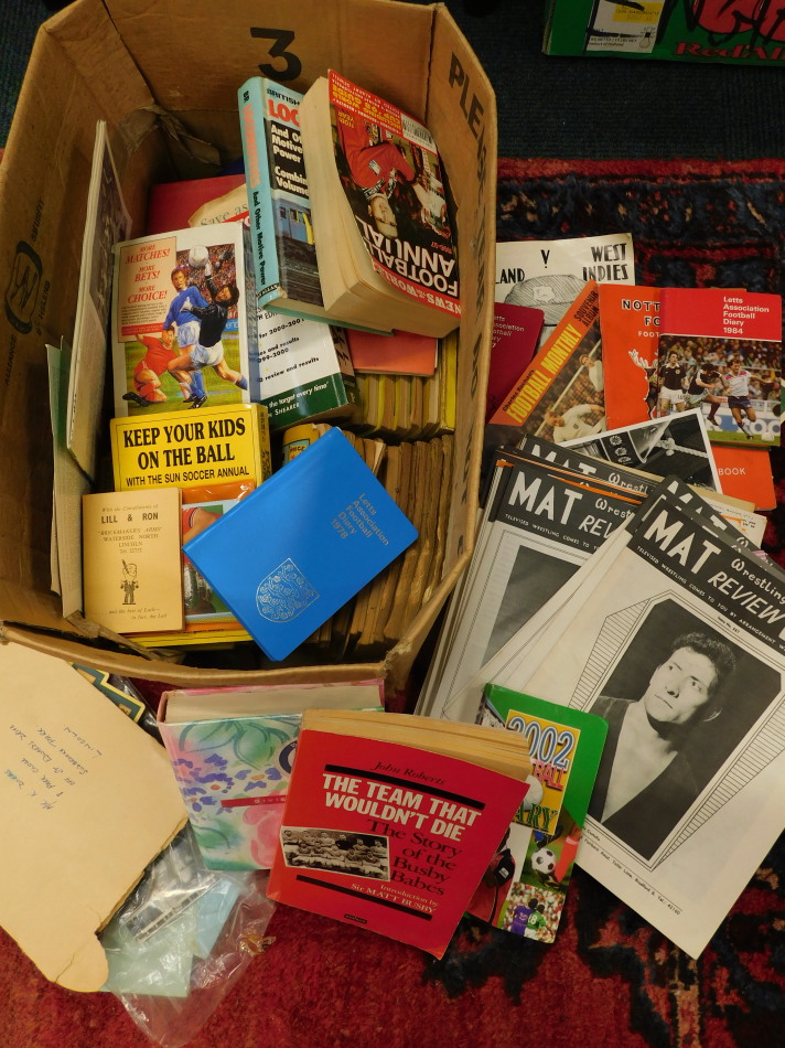 Appraisal: A quantity of football cricket and wrestling ephemera to include