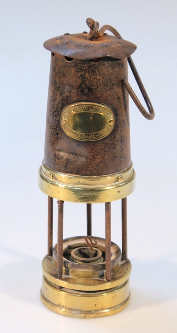 Appraisal: A thC Patterson Lamps Felling-on-Tyne miner's lamp with brass mounts