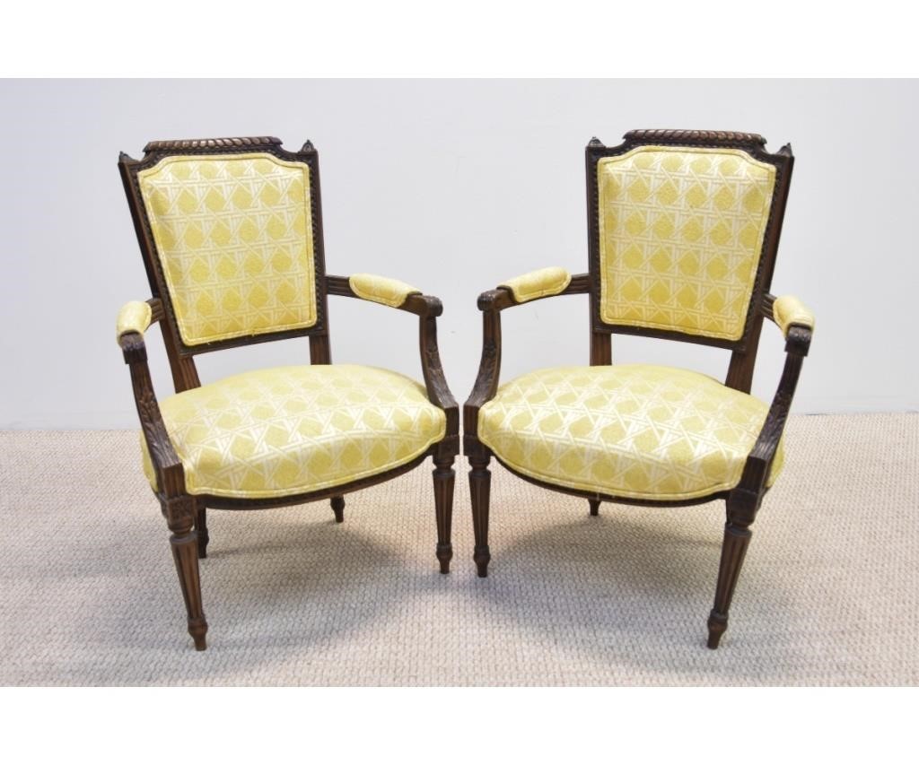 Appraisal: Pair of French walnut open armchairs circa h x w