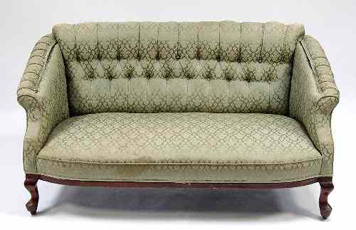 Appraisal: A button upholstered settee on cabriole legs cm wide