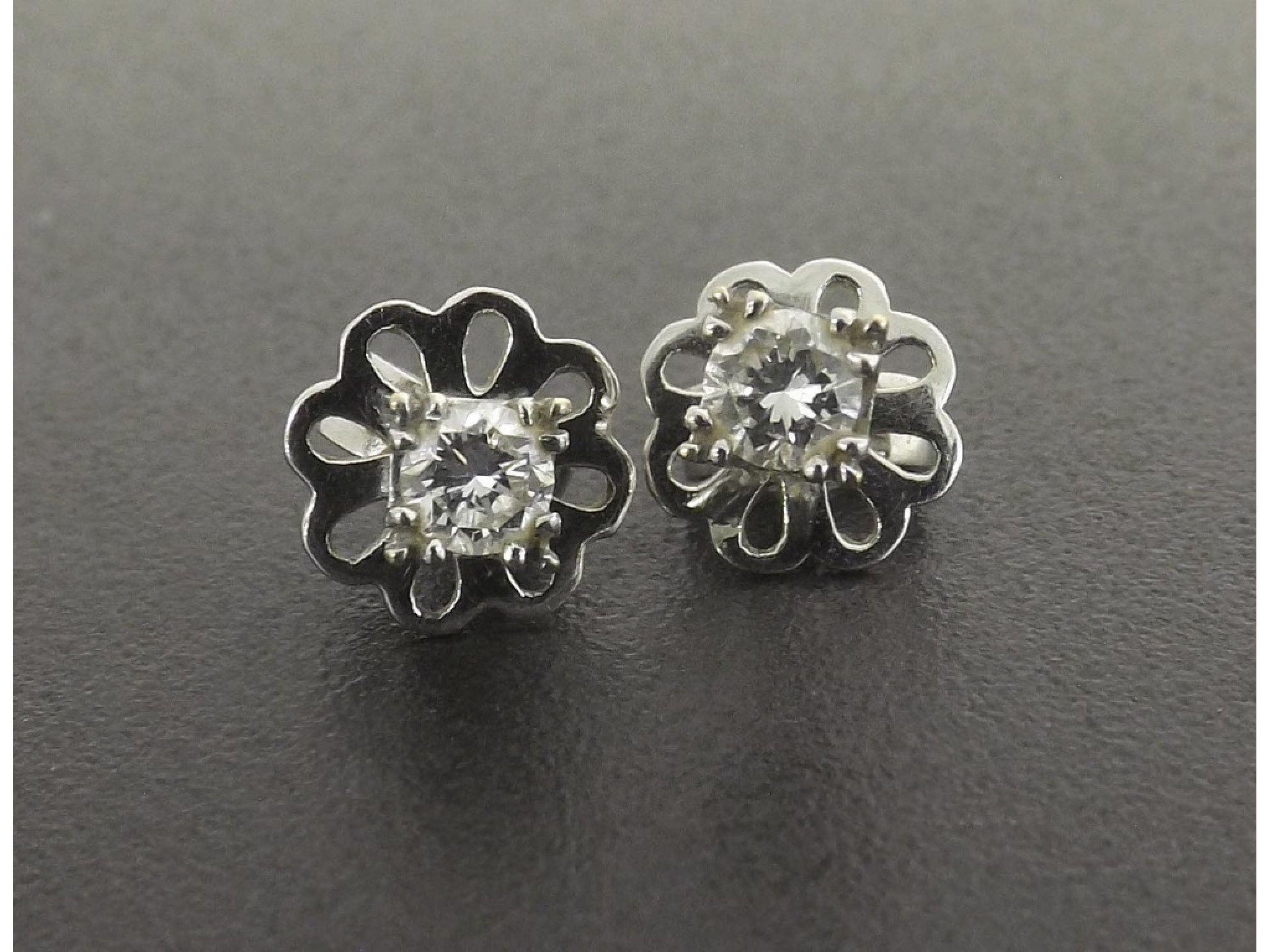 Appraisal: - -a Pair of round brilliant-cut diamond ear studs with