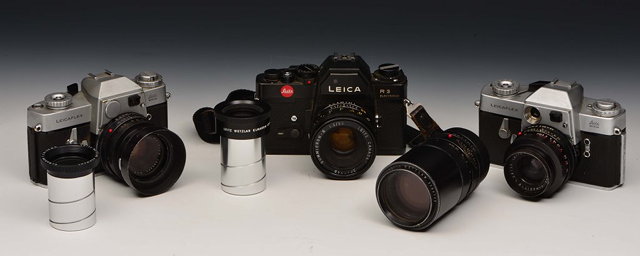 Appraisal: A COLLECTION OF LEICA LEITZ CAMERA AND LENSES comprising of