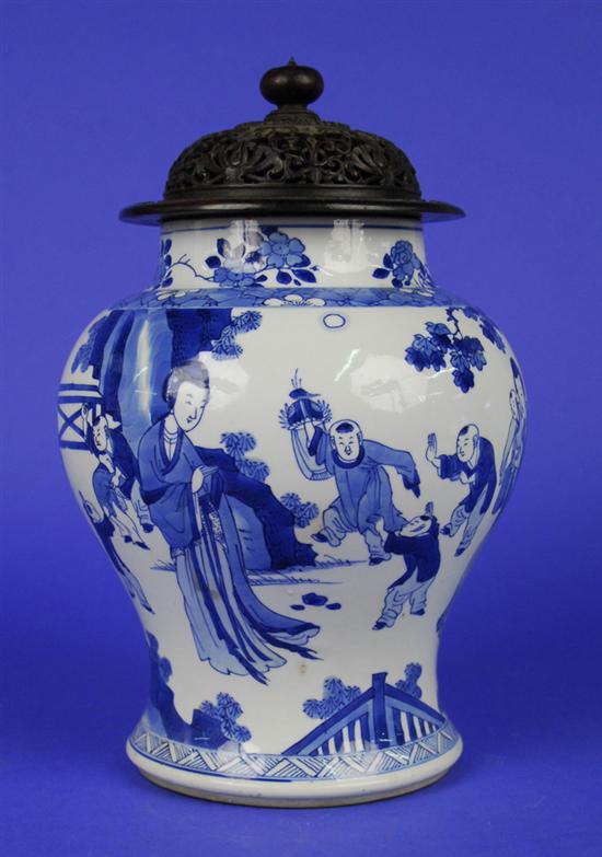 Appraisal: CHINESE BLUE AND WHITE VASE Kangxi Period with carved hardwood