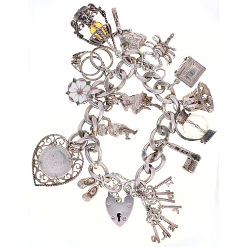 Appraisal: A silver charm bracelet and padlock approximately cm l g