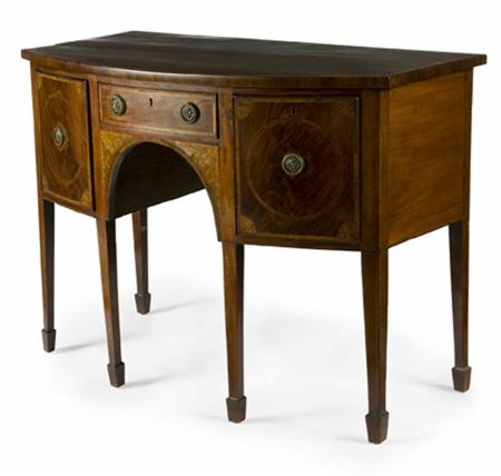 Appraisal: A George III mahogany and marquetry bow front sideboard the